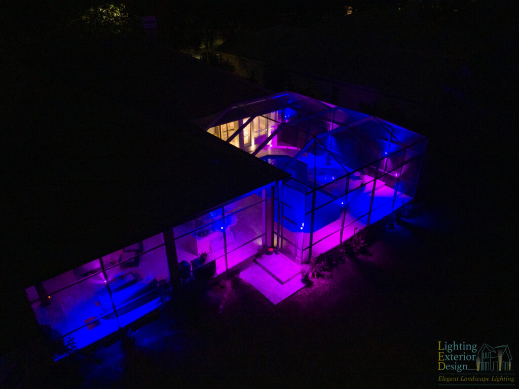 RGBW5.0 Up Down Sconce Fixture displaying blue and pink colors. Shot with a drone